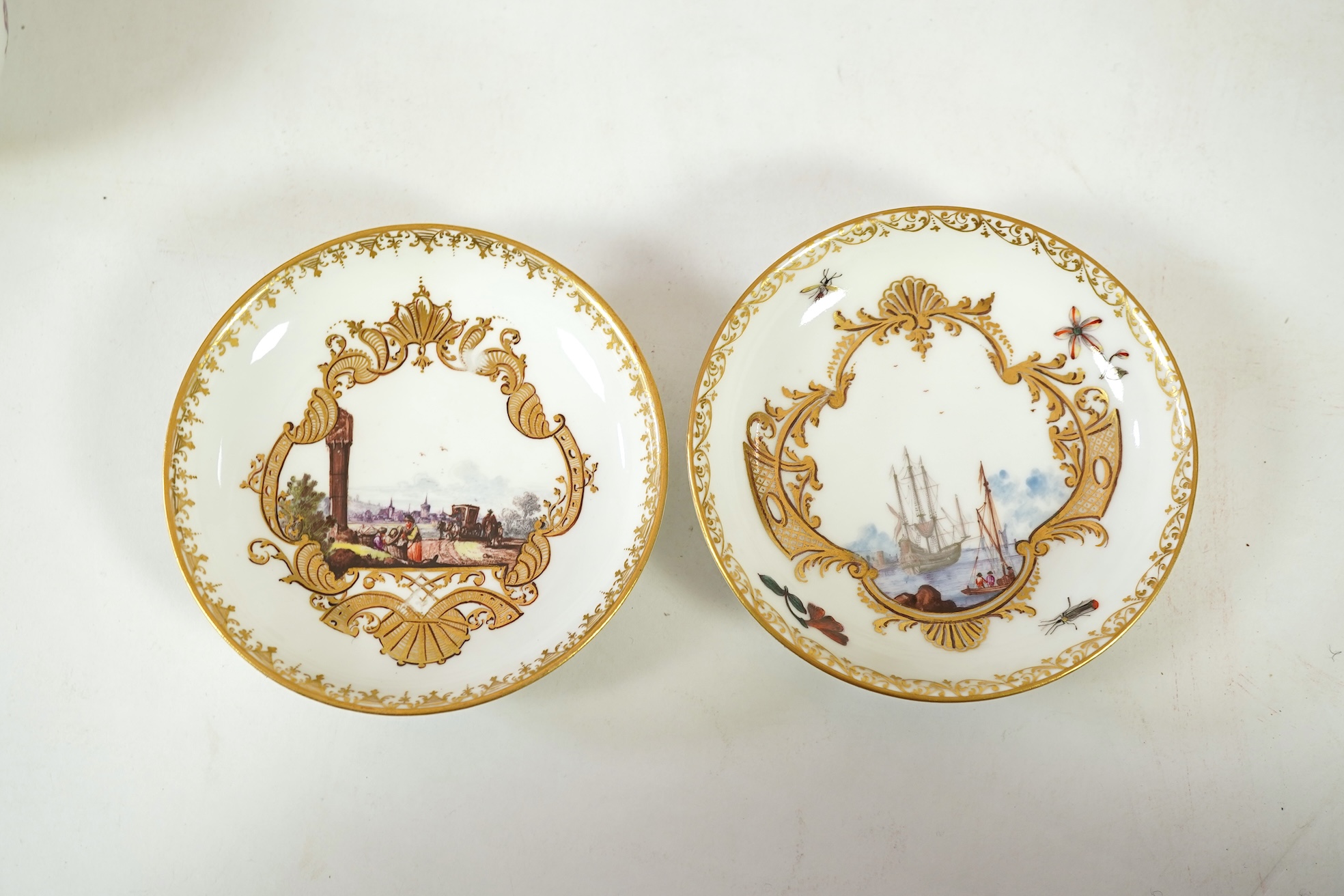A Meissen cup and saucer, similar tea bowl and two saucers, c.1735-45